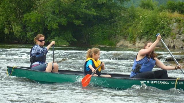 Girl power canoeing the rapids on the Wye