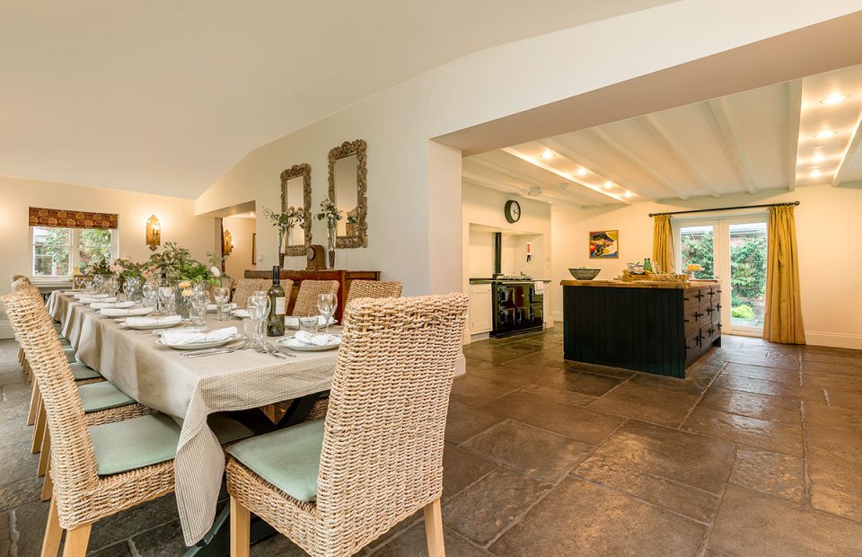 Dining area next to working kitchen - such a sociable space