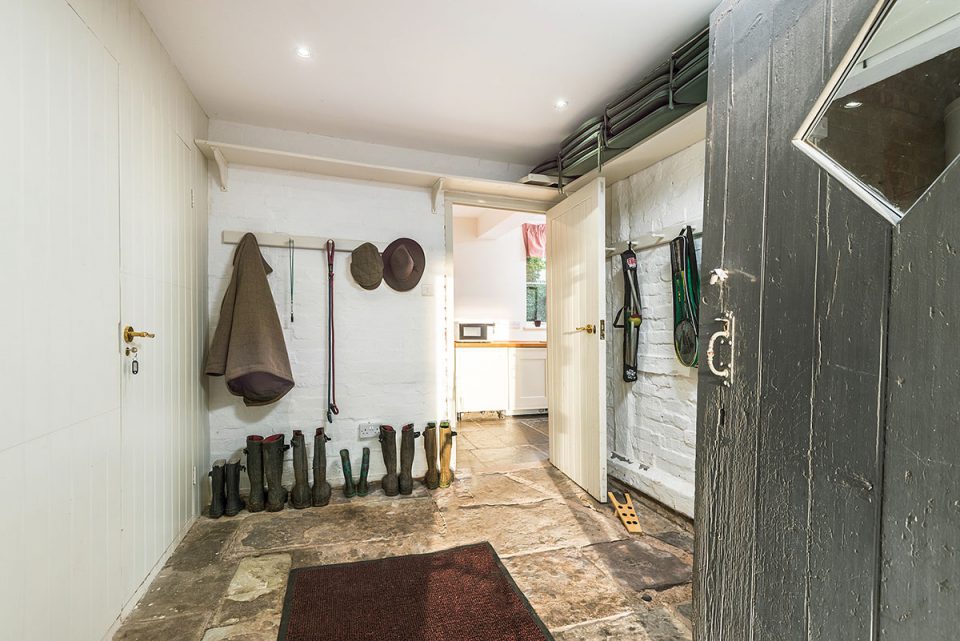 Space for coats, wellies, dod, dog leads and sports equipment in boot room