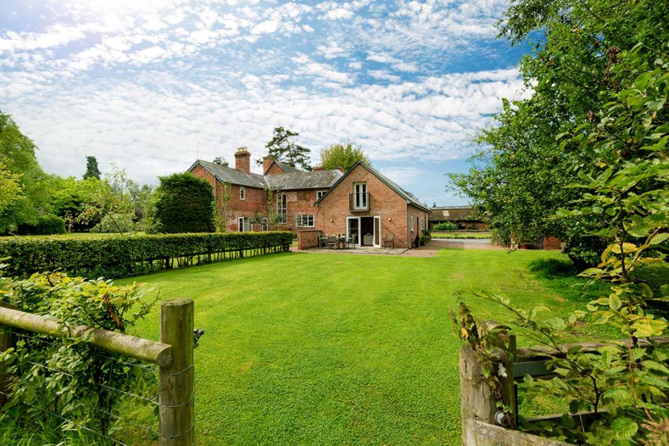 Monnington House on the left handside and cottage on the right with its own terrace