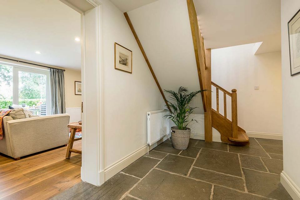 Spacious hall in the cottage with lovely oak staircase