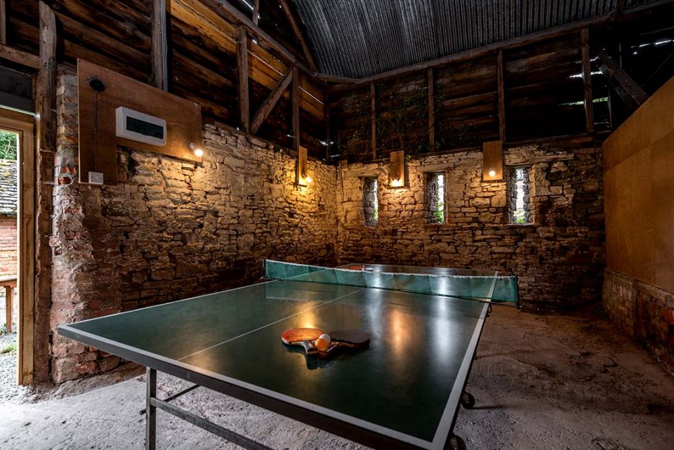 Rustic table tennis room in the outbuildings