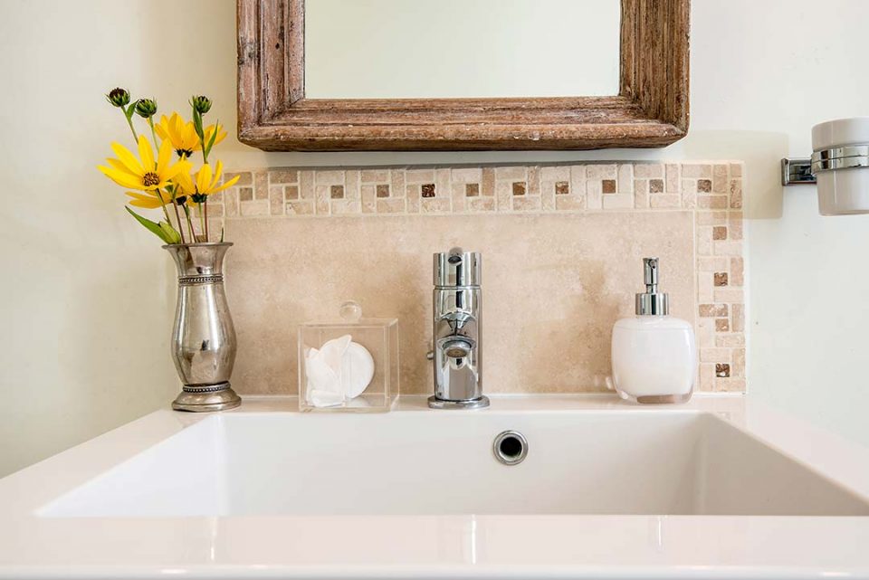 Dahlia Bishop of York in Agatas en suite bathroom with lovely bath products from the Little Soap Company