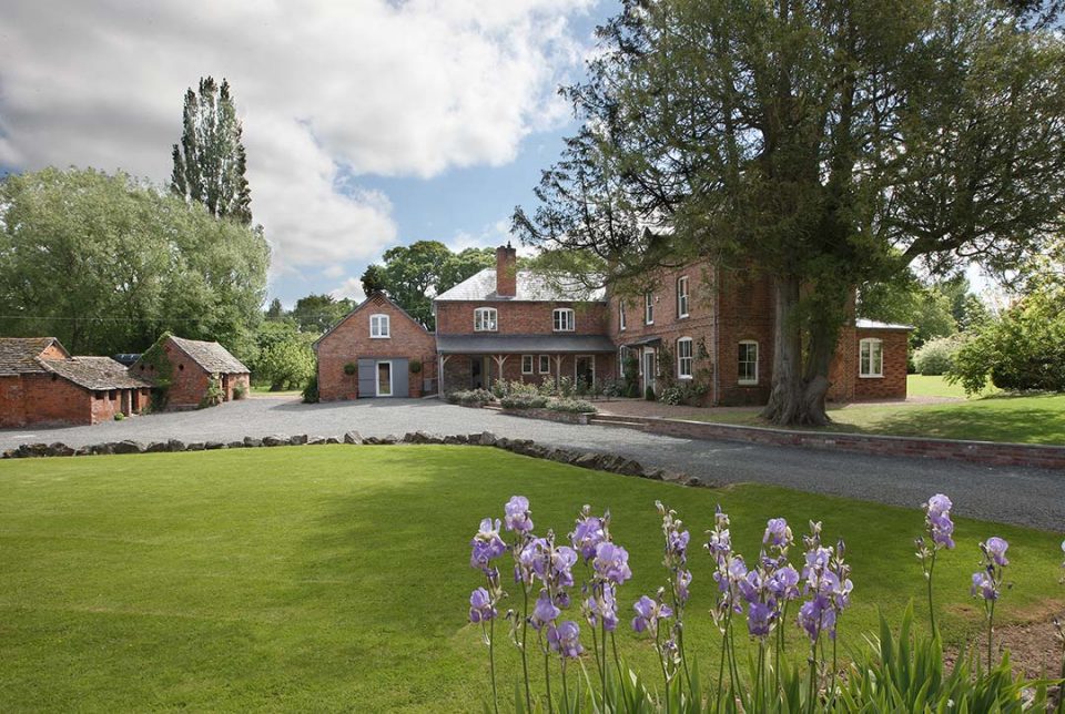 View of Monnington House and Cottage, drive and glimpse of gardens