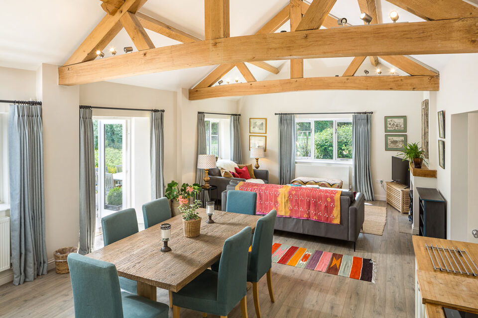The Cider Mill is a spacious holiday cottage with three bedrooms. It has a large open plan kitchen, dining and living area with French doors leading to the patio | Monnington House and Cottages, Herefordshire