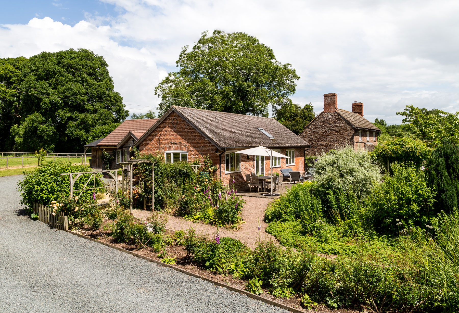 The Cider Mill is a spacious family holiday cottage with three bedrooms. It has an enclosed garden and ample private parking | Monnington House and Cottages, Herefordshire